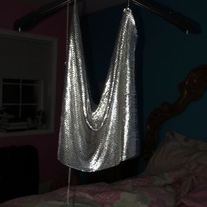 I am selling a silver backless top